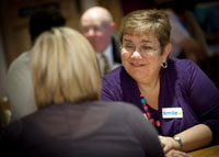 Image shows two ladies engaged in a ten minute 1 to 1 meeting at a 4N breakfast meeting.