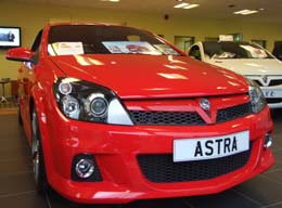 Vauxhall Cars: The new Astra, also sells Vans Vectra Corsa Meriva Zafira Combo Antara