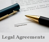 Pen and a contract, representing Legal Agreements.