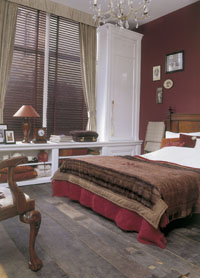 Venetian blinds in bedroom.