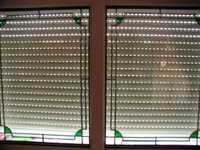 Domestic security screens fitted by Rolux UK to inside of room.