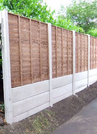 Wany Lap fence with three concrete bargeboards.