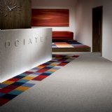 Reception area fitted with Tufted Carpet Tiles using a variety of colours.