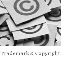 Pile of cards containg the copyright symbol, representing expertise in Trademark and Copyright Law.