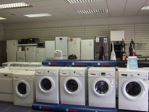 Washing machines and white goods on display in Robins Hodgsons shop in Macclesfield. Manufacturers include Bosch, Belling, Groenje, Hotpoint, Miele and Siemens.