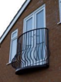  Decorative ornate wrought iron Juliette balcony.