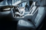 Interior view accross front seats of Jaguar XJ Limousine.