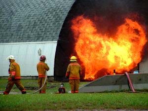Fire Scene, Building on Fire with Fire Fighters
