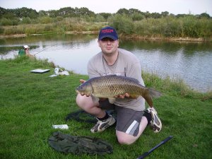 A satisfied customer with a Mirror Carp