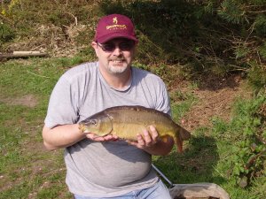 Mick with a Mirror Carp