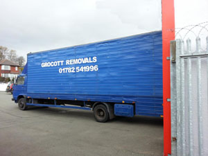 Side view of Grocotts removal van.